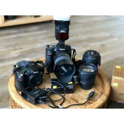 Nikon D7100 en D80 met flitser, 3 lenzen, 2 accu’s en tassen