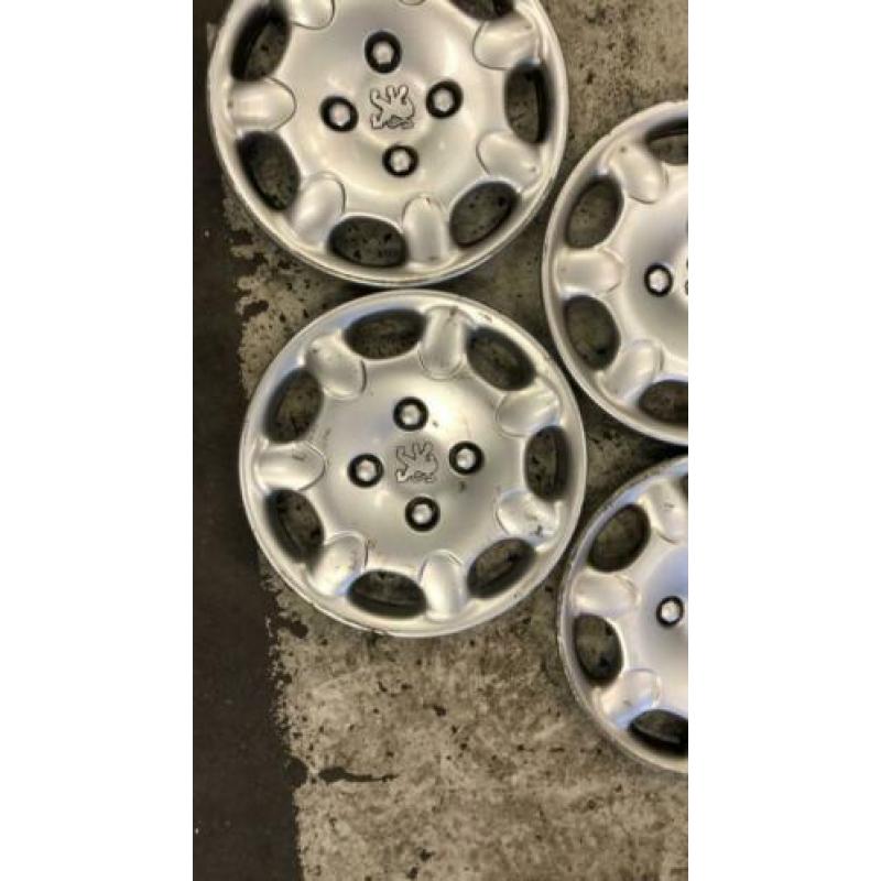 Wieldoppen set 13 inch Peugeot origineel