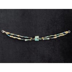 Bracelet of Egyptian faience mummy beads and Eye of Horus or